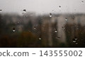 Rain Drops Running Down a Window on a Gloomy Autumn Day 143555002