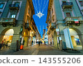 Old town of Alba illuminated with Christmas lights in the evening. 143555206