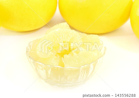 Tosa Buntan (pomelo), grown in Kochi Prefecture, large citrus fruit against a bright background. Tosa Buntan (pomelo), grown in Kochi Prefecture, large citrus fruit against a bright background. 143556288