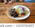 Lunch was a steak set meal. 143556407