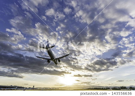 An autumn evening, a plane landing at Sendai Airport, from view #27, Natori City, Miyagi Prefecture. An autumn evening, a plane landing at Sendai Airport, from view #27, Natori City, Miyagi Prefecture. 143556636