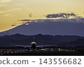 An autumn evening, a plane taking off from Sendai Airport, photographed from location #27, in Natori City, Miyagi Prefecture. 143556682