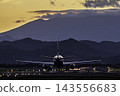 An autumn evening, a plane taking off from Sendai Airport, photographed from location #27, in Natori City, Miyagi Prefecture. 143556683