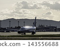 Sendai Airport in autumn: Airplane taxiing, from 27 at dusk, Natori City, Miyagi Prefecture. 143556688
