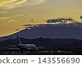 Sendai Airport in autumn: Airplane taxiing, from 27 at dusk, Natori City, Miyagi Prefecture. 143556690