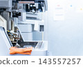 Factory machinery. Manufacturing, processing, metal, electrical discharge, cutting, machining, welding, NC, cutting, industrial, machine, wire, electrical 143557257