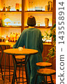 The back view of a woman with a distinctive aura. 143558914