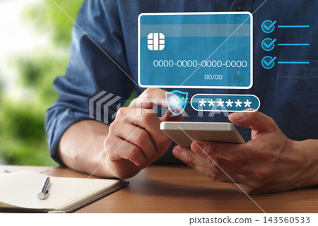 Secure online payment. Man using smartphone to pay by credit card on e-commerce website. Mobile payment Secure online payment. Man using smartphone to pay by credit card on e-commerce website. Mobile payment 143560533