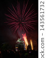 A large flower blooming in the night sky 143561732