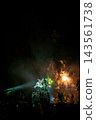 A large flower blooming in the night sky 143561738