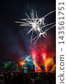 A large flower blooming in the night sky 143561751