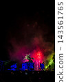 A large flower blooming in the night sky 143561765