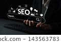SEO Strategy and Optimization Concept with Search Bar and Digital Icons Representing Online Marketing and Web Development Techniques Gluon 143563783