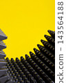 Abstract shapes and geometric objects on a yellow background. 143564188