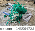 Masking tape and construction waste generated during the sealing work for exterior wall painting. 143564728