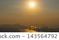 Hong Kong Oct 11 2026 across golden Victoria Harbour water channel 143564792