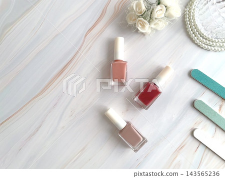 Cute nail care image background featuring manicure and nail file Cute nail care image background featuring manicure and nail file 143565236