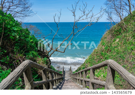 The Sea of Japan stretches out beyond the stairs. The Sea of Japan stretches out beyond the stairs. 143565679