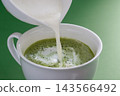 Matcha Latte - Matcha latte made in a café au lait bowl 143566492