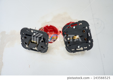 Electrical outlets pulled from wall during installation Electrical outlets pulled from wall during installation 143566525