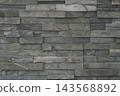 Dark Gray Stacked Slate Stone Wall Cladding Tile Texture Background 143568892