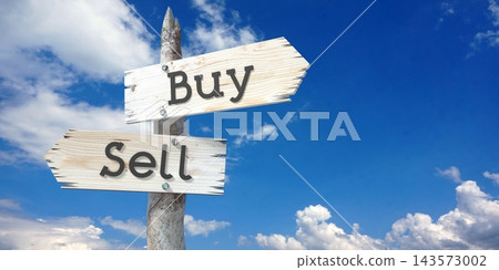 Buy and sell - wooden signpost with two arrows Buy and sell - wooden signpost with two arrows 143573002