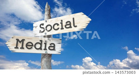 Social media - wooden signpost with two arrows Social media - wooden signpost with two arrows 143573003