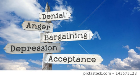 Denial, anger, bargaining, depression, acceptance - wooden signpost with five arrows Denial, anger, bargaining, depression, acceptance - wooden signpost with five arrows 143573128