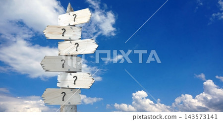 Question marks - wooden signpost with six arrows Question marks - wooden signpost with six arrows 143573141
