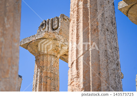 Ancient columns standing in Temple of Aphaia ruins on Aegina island Ancient columns standing in Temple of Aphaia ruins on Aegina island 143573725