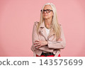 Senior woman expressing confidence and active maturity 143575699