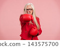 Mature woman boxing showing strength and active lifestyle 143575700