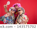 Senior friends having fun celebrating active healthy aging 143575702
