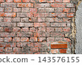 Grunge old and crack red color brick pattern wall textured background. 143576155