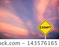 Yellow transportation sign with word exempt on violet color sky background 143576165