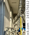 A house exterior painting construction site and the scaffolding that has been erected. 143576812