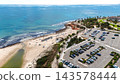 Aerial view of Mil Palmeras beach and parking lot in Spain 143578444