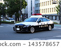 A Hyogo Prefectural Police patrol car driving through Himeji City. 143578657