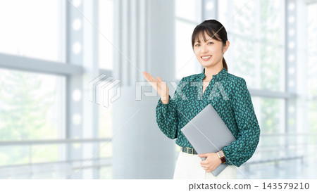 Woman/businesswoman giving directions by hand Woman/businesswoman giving directions by hand 143579210