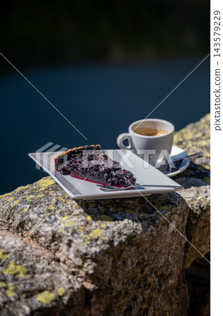 Calm lake view with berries on railing gentle ripples. Calm mountain lake view with fresh berries on stone railing and gentle water ripples, tranquil lakeside moment with forest reflections and quiet Calm lake view with berries on railing gentle ripples. Calm mountain lake view with fresh berries on stone railing and gentle water ripples, tranquil lakeside moment with forest reflections and quiet 143579229
