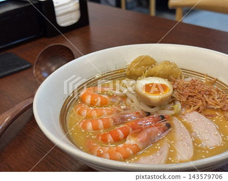 Hong Kong seafood and chicken breast soup rice with prawns Hong Kong seafood and chicken breast soup rice with prawns 143579706