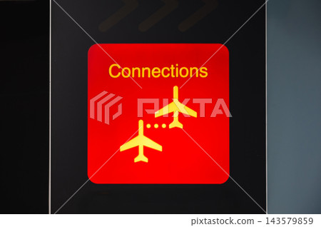 Red connections sign points travelers to their next gate. A bright red connections sign with plane icons points travelers on toward their next gate. Clear wayfinding colour built to cut through a busy Red connections sign points travelers to their next gate. A bright red connections sign with plane icons points travelers on toward their next gate. Clear wayfinding colour built to cut through a busy 143579859
