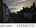 Arundel street beneath a misty castle 143582747