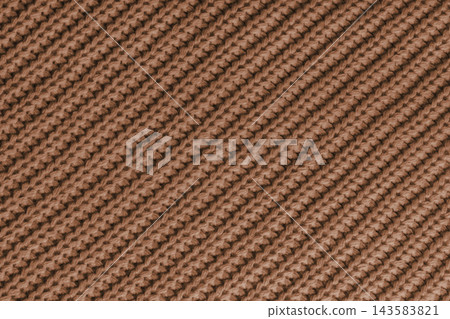 Close up, macro brown knitted fabric texture with diagonal yarn stitches, cloth wool background Close up, macro brown knitted fabric texture with diagonal yarn stitches, cloth wool background 143583821