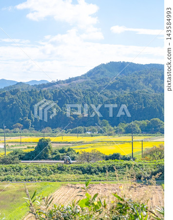 A railcar running through a rural landscape on the former Kurayoshi Line of the Japanese National Railways. A railcar running through a rural landscape on the former Kurayoshi Line of the Japanese National Railways. 143584993