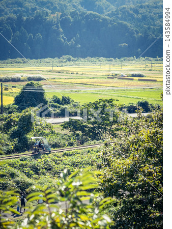 A railcar running through a rural landscape on the former Kurayoshi Line of the Japanese National Railways. A railcar running through a rural landscape on the former Kurayoshi Line of the Japanese National Railways. 143584994