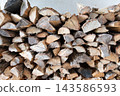 Stacked firewood 143586593