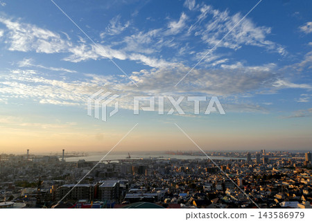 A beautiful view of Kobe bathed in morning light. A beautiful view of Kobe bathed in morning light. 143586979