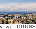 A panoramic view of the port city of Kobe from a hilltop. 143586980