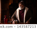 Elegant Santa seated at bar with an amber drink 143587213